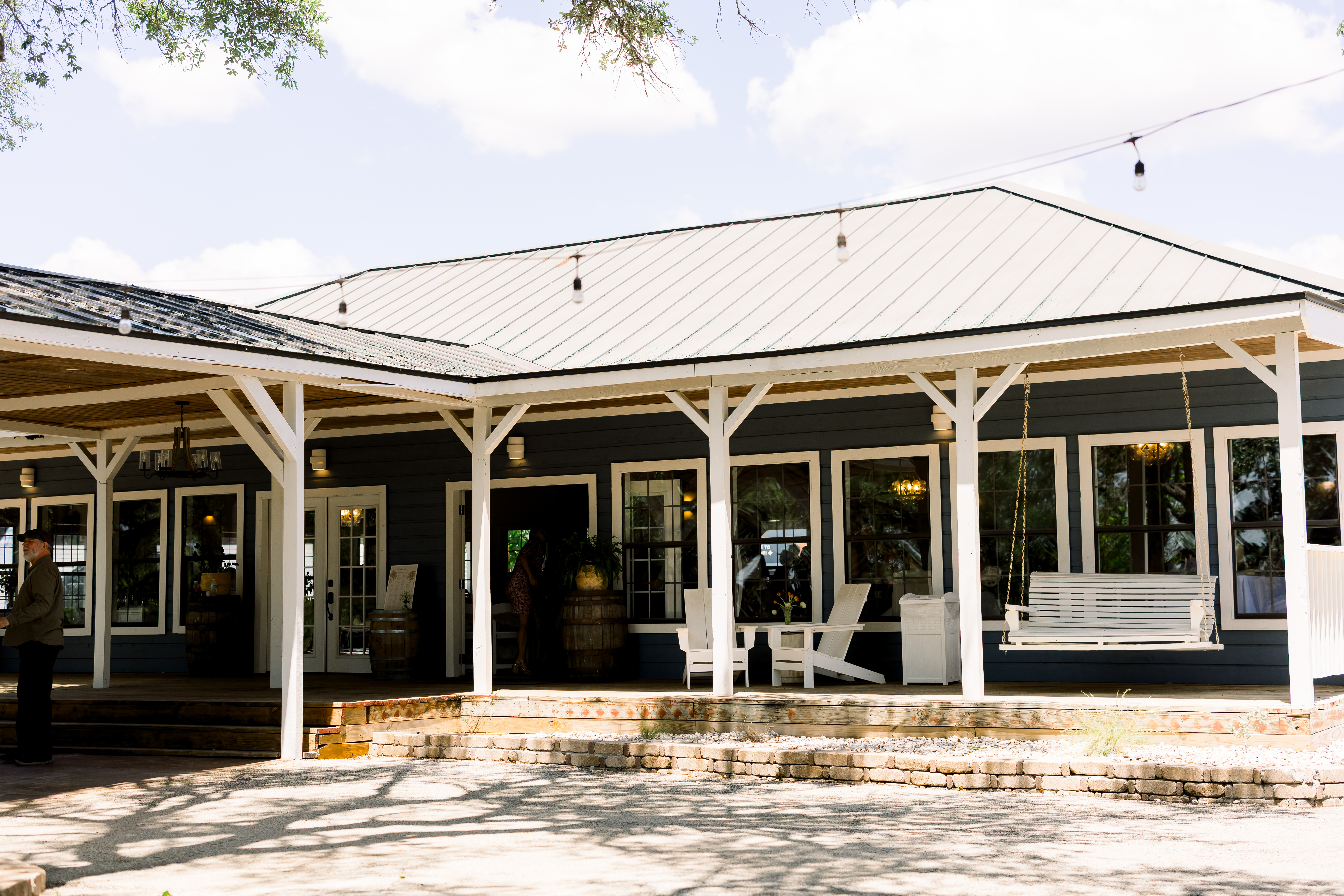 The hall porch with its swing and string lights