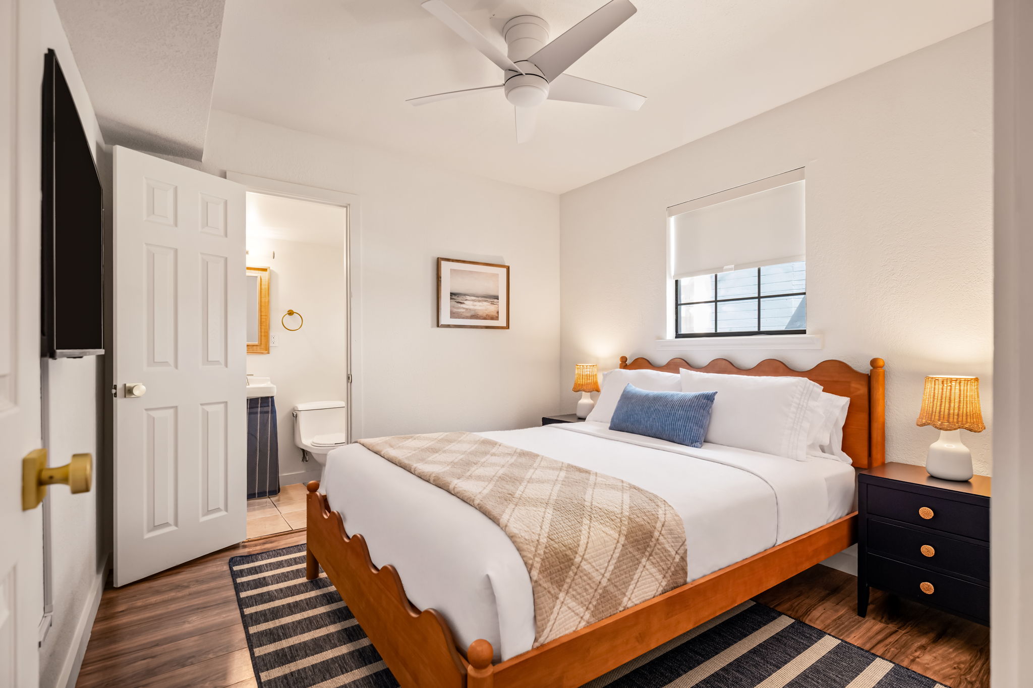 One Bedroom Suite with Loft bedroom under a ceiling fan