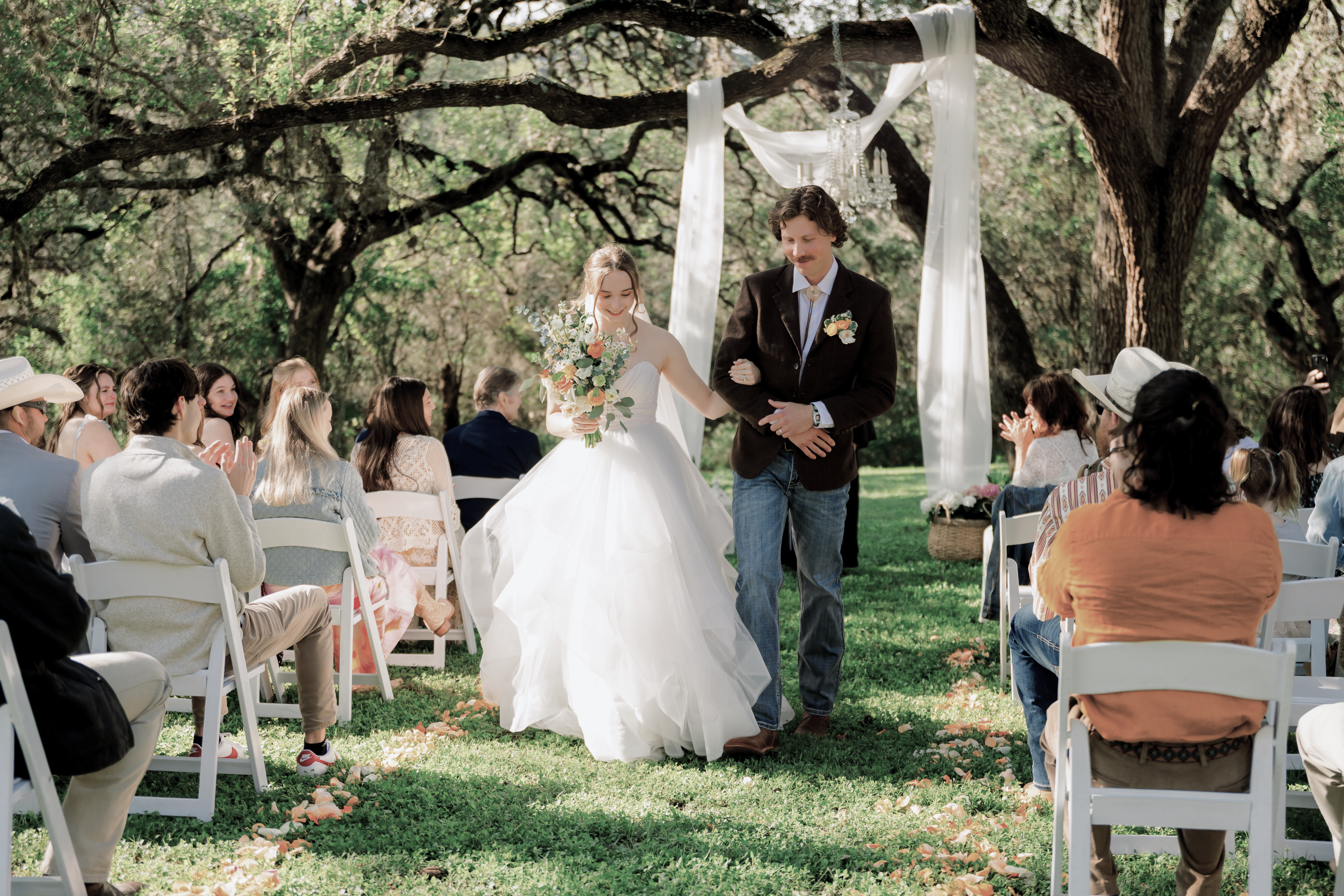 The newlyweds walking back down the aisle