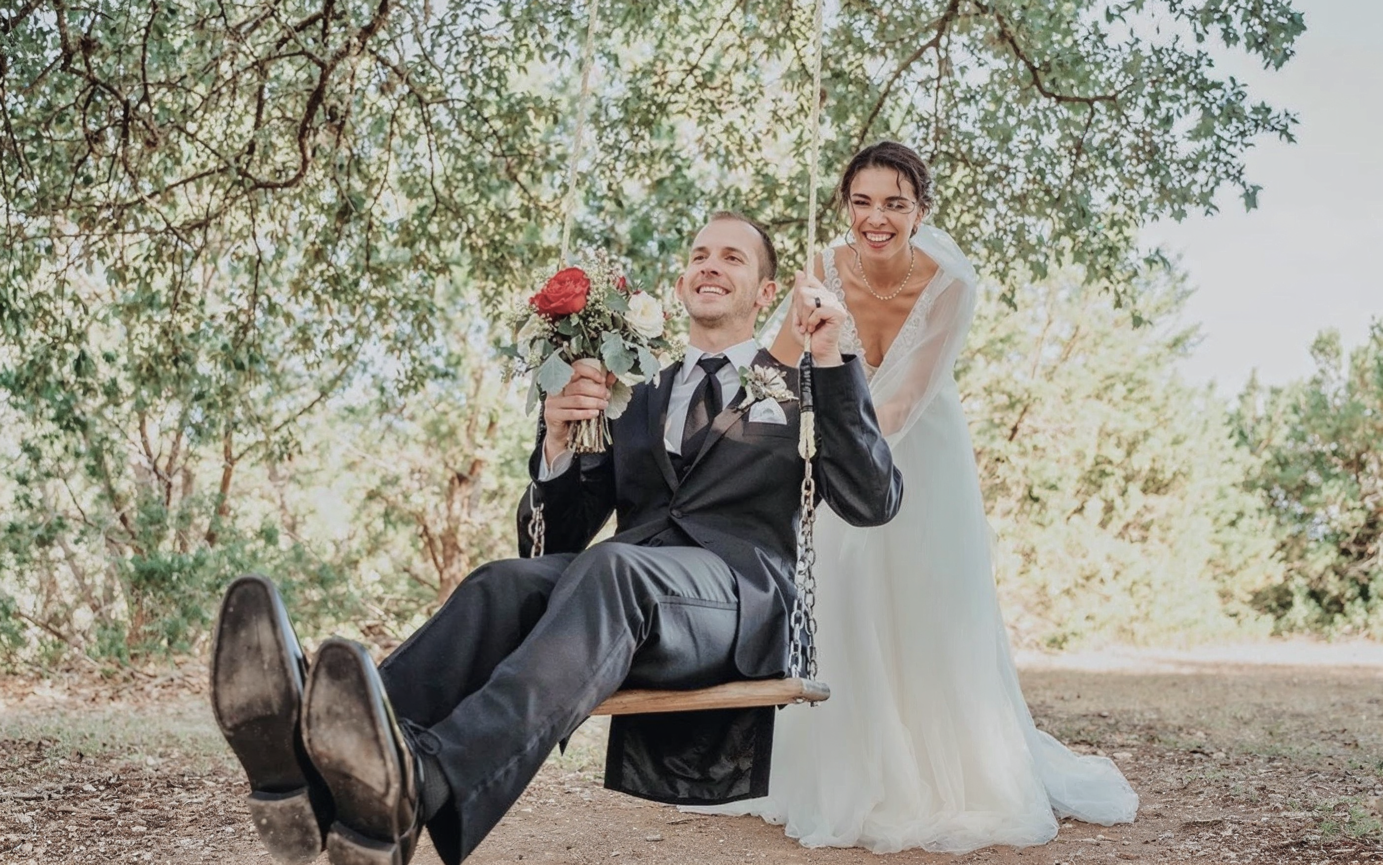The couple on the oak-tree swing