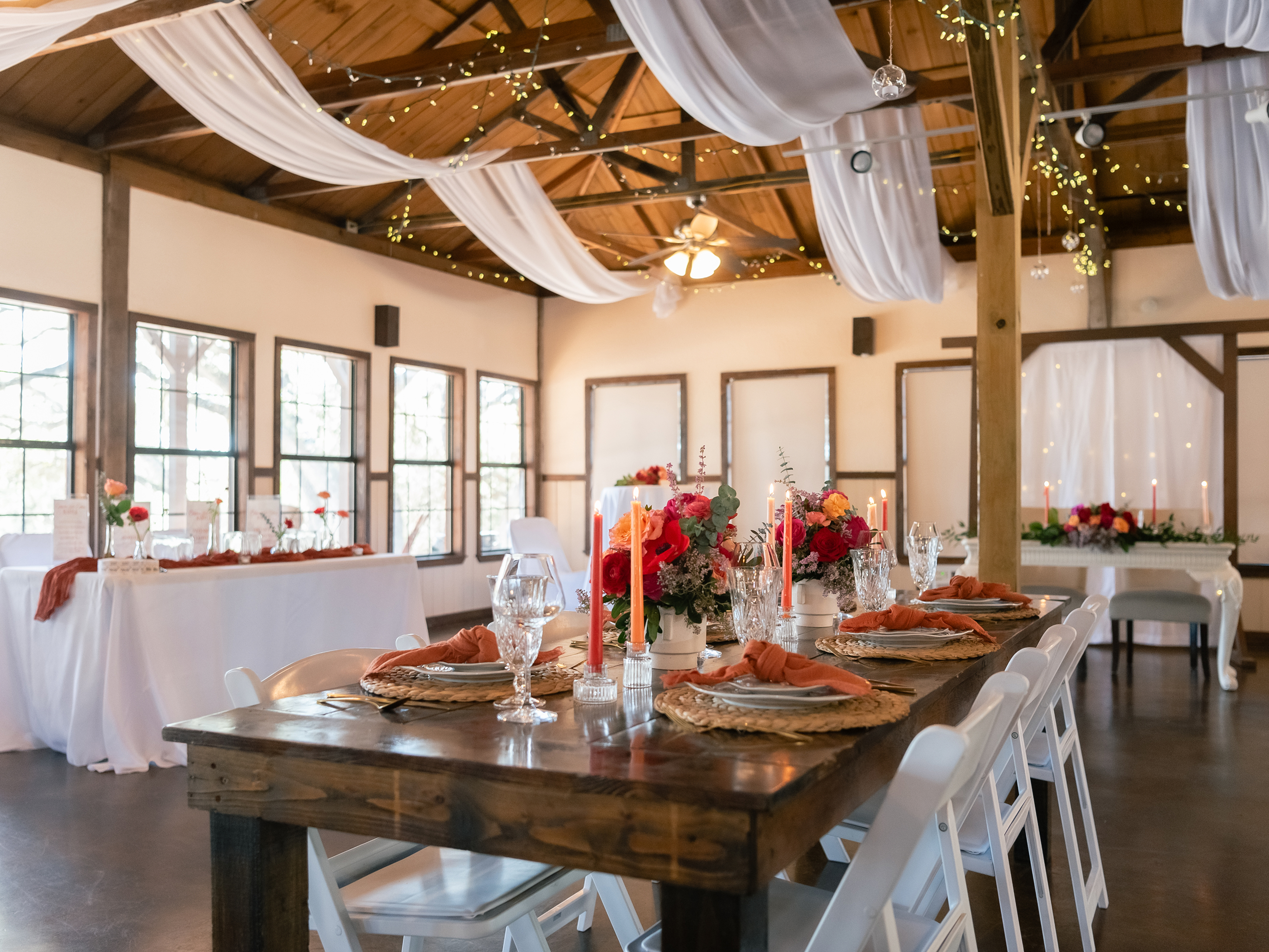 Reception in the hall with draped ceiling and string lights